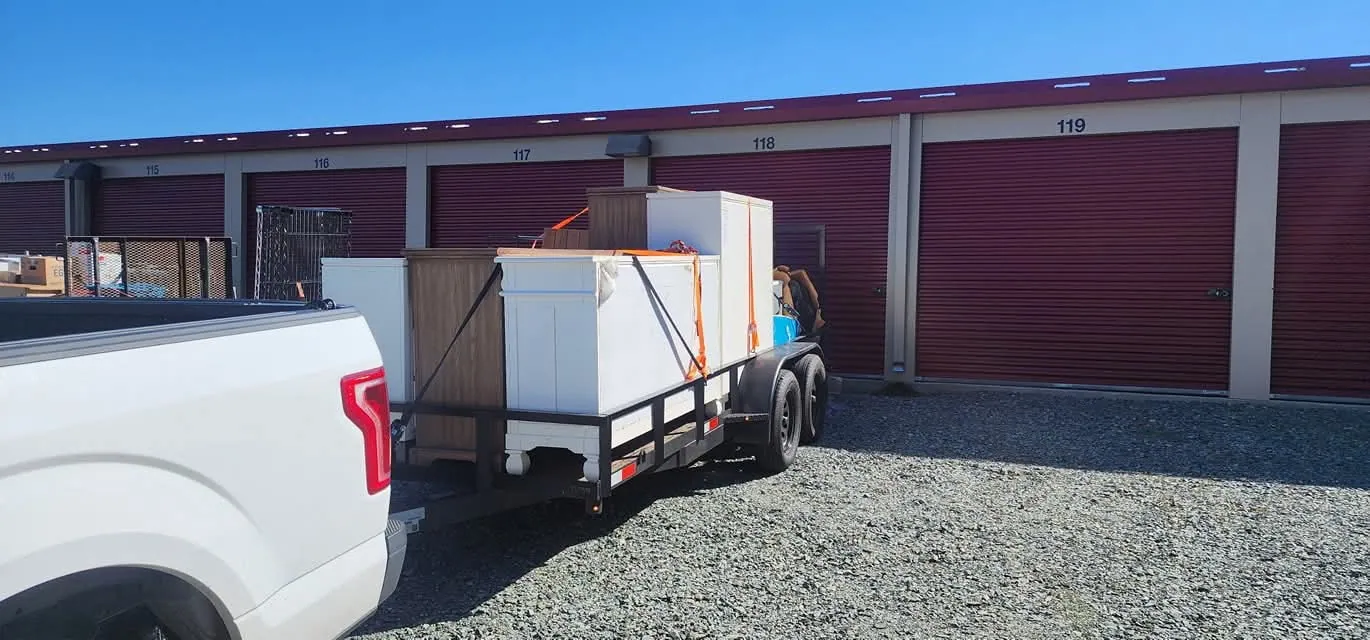 Midway Junk Removal trailer staged for a residential clean out